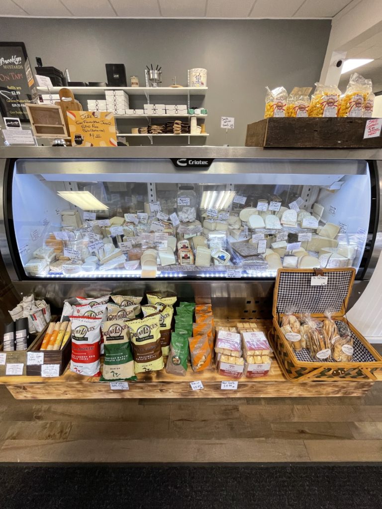 The cheese case at Old Brooklyn Cheese Co.