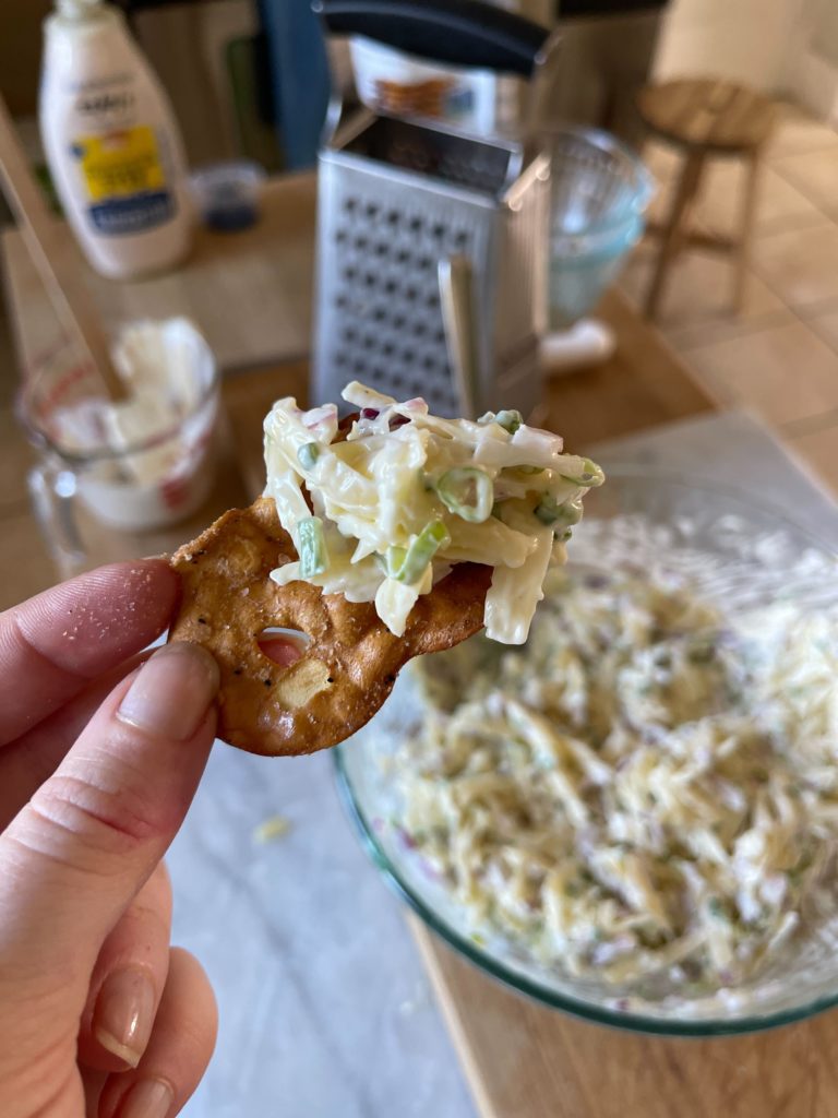 Jarlsberg Cheese Dip on a pretzel chip