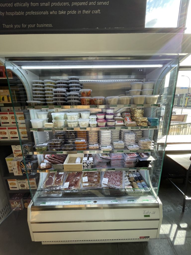 The soft cheese and charcuterie case at France44