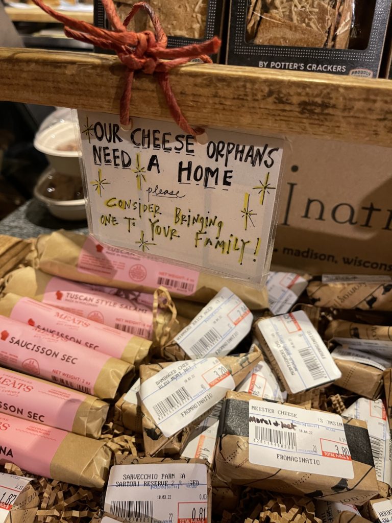 The display case of "cheese orphans" - little nubs of cheeses that need a home