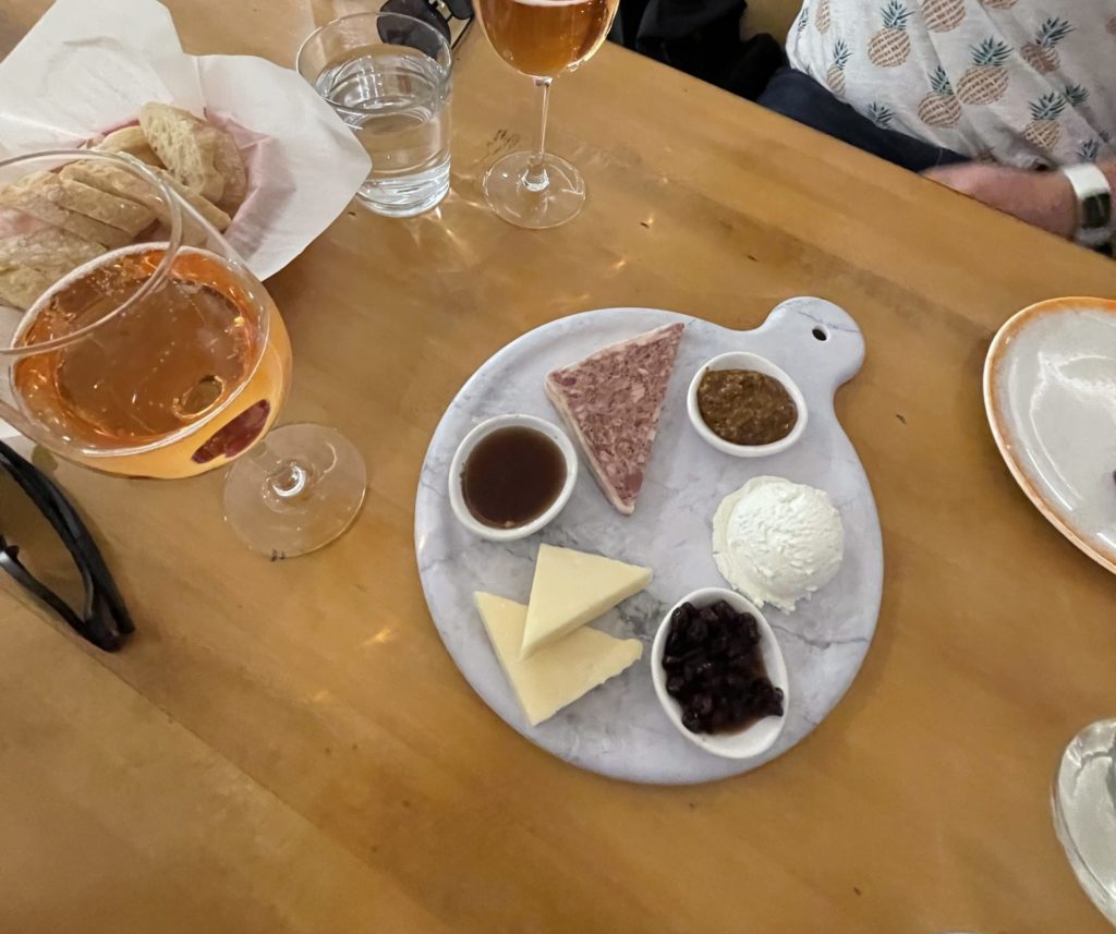 The cheese plate with delicious accompaniments at Beautiful Rind in Chicago