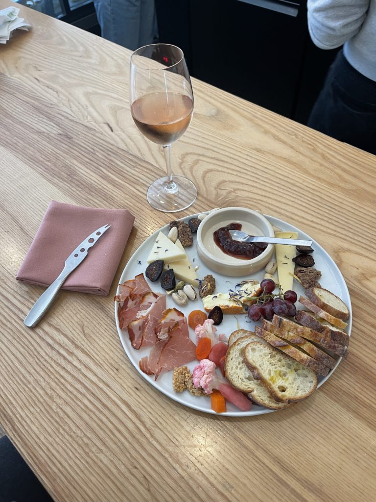 A cheese flight and glass of rosé at The Rhined cheese shop in Cincinnati, Ohio