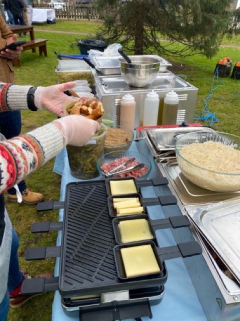 Using the grill pan to prepare raclette at the Christmas in Edgartown Holiday Faire in the Town Green. We served raclette over either fingerling potatoes or pretzel nuggets. Folks could get it "fully loaded" with finocchiona salami, gherkins, sauerkraut, and spicy whole grain mustard! 