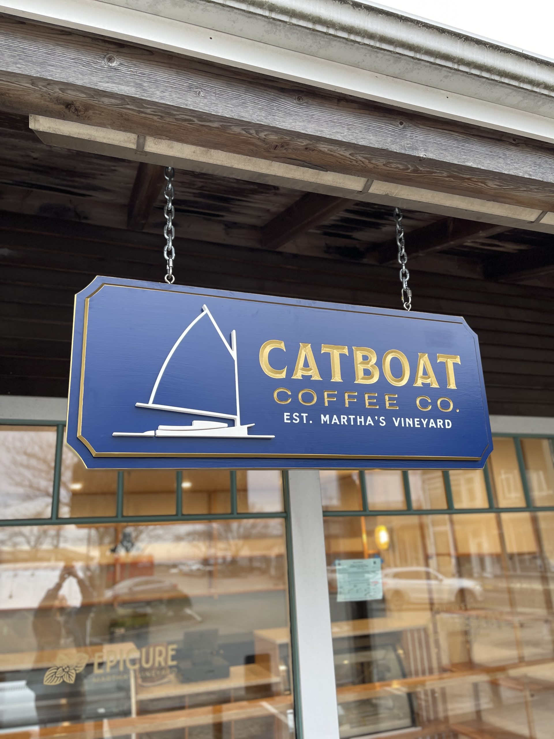 Image of the exterior of Catboat Coffee Co., a specialty beverage and culinary destination on Martha's Vineyard, and home to the Martha's Vineyard Cheesery cheese counter!