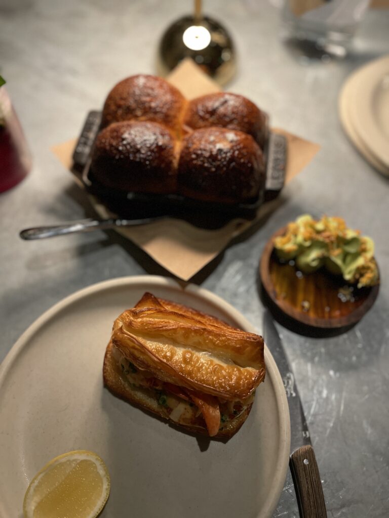 The lobster roll and parker house rolls at Twelve Maine.