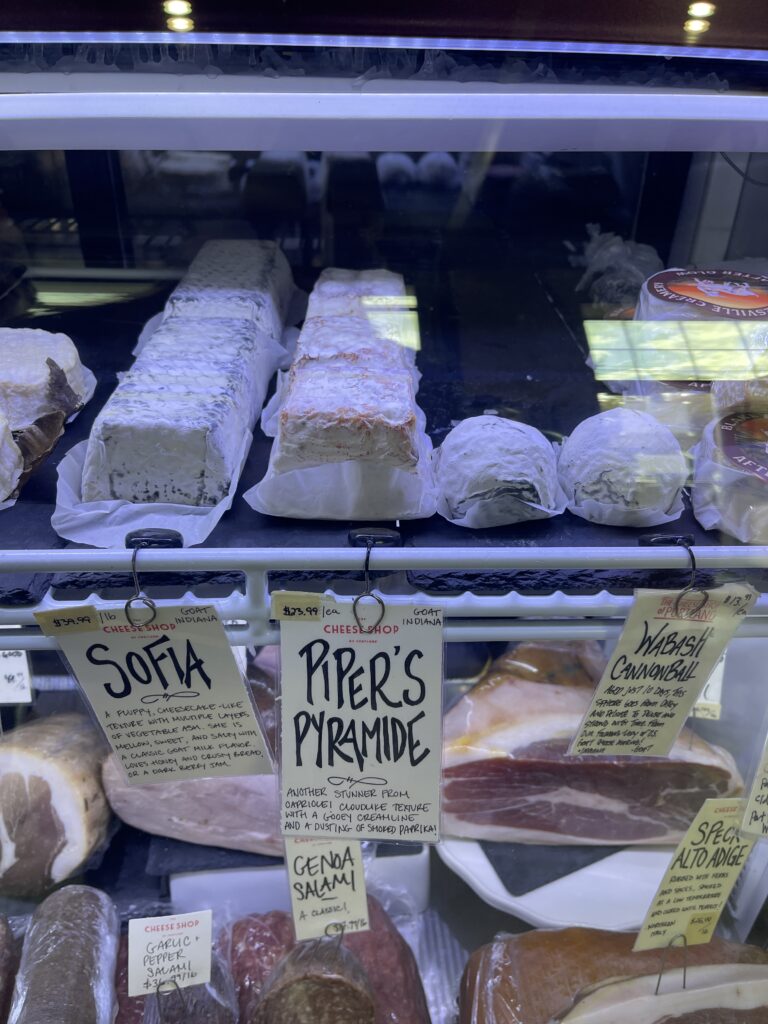 Soft cheeses in the case at The Cheese Shop of Portland. Bloomy, geotrichum rind cheeses.